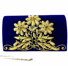 Load image into Gallery viewer, Luxury cobalt blue velvet evening clutch bag embroidered with three daisy flowers in gold color and embellished with genuine gemstones, floral wedding clutch, blue and gold zardozi purse.
