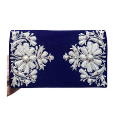 Load image into Gallery viewer, Cobalt blue velvet luxury evening clutch bag embroidered with two large flowers in white silver and embellished with genuine gemstones, floral wedding clutch, blue and silver zardozi purse.