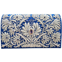 Load image into Gallery viewer, Luxury wedding clutch bag in blue silk embroidered with silver all over floral pattern and embellished with central facet cut amethyst gemstone and aqua chalcedony gemstones, bridal purse, mother of the bride purse, blue silver zardozi purse.