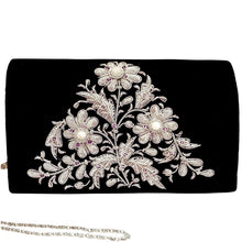 Load image into Gallery viewer, Luxury black velvet evening clutch bag embroidered with a bouquet of three silver flowers and embellished with genuine moonstone and amethyst gemstones, floral wedding clutch, black and silver zardozi purse.