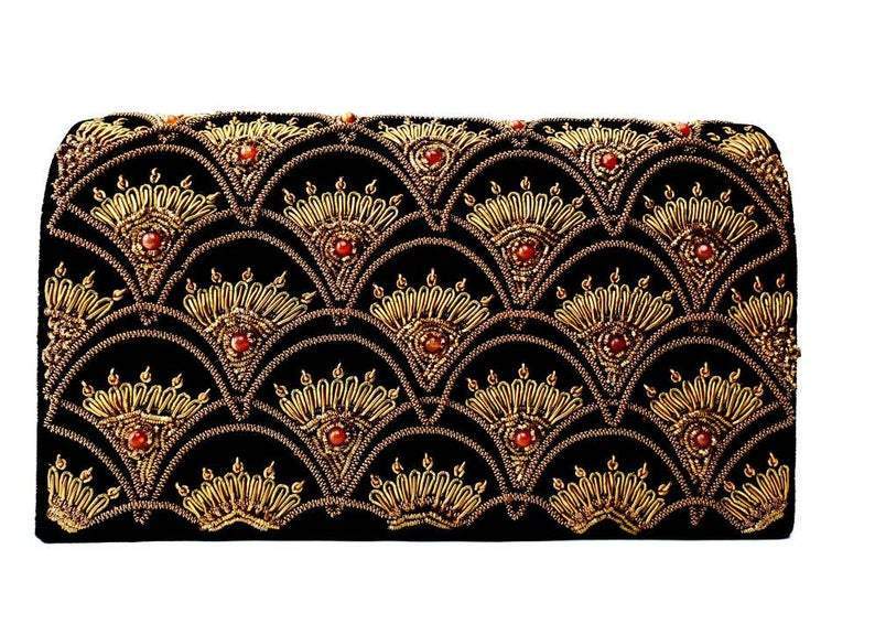 Black velvet and gold embroidered evening bag with carnelian stones.