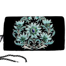 Load image into Gallery viewer, Luxury black velvet evening clutch bag embroidered with large central floral wreath in teal blue and green color and embellished with genuine lapis lazuli and garnet gemstones, floral wedding clutch, black and blue zardozi purse.