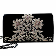 Load image into Gallery viewer, Black velvet evening bag embroidered with antique silver daisy flowers and inlaid with amethysts and garnets. 
