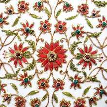 Load image into Gallery viewer, Bridal memory box embroidered with red flowers and inlaid with ruby gemstones, close up view BoutiqueByMariam.