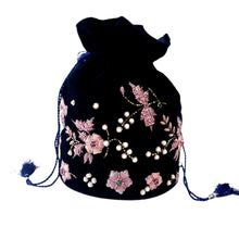 Load image into Gallery viewer, Navy blue velvet potli bag bucket bag embroidered with pink metallic flowers and inlaid with semi precious stones, Indian potli bag.