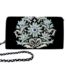 Load image into Gallery viewer, Luxury black velvet evening clutch bag embroidered with large central floral wreath in teal blue and silver color and embellished with genuine lapis lazuli and garnet gemstones, floral wedding clutch, black and blue zardozi purse.