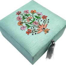 Load image into Gallery viewer, Robin egg blue jewelry storage box hand embroidered with silk flowers and embellished with semi precious gemstones. 
