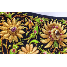 Load image into Gallery viewer, Black and gold embroidered clutch with citrine stone and rubies, close up view.