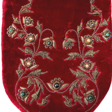 Load image into Gallery viewer, Designer red velvet slim crossbody bag embroidered with antique gold flowers and vines and embellished with semi precious stones, zardozi work., close up view.