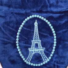 Load image into Gallery viewer, Luxury blue velvet crossbody bag hand embroidered with Eiffel Tower and turquoise beads, French purse, close up view. 
