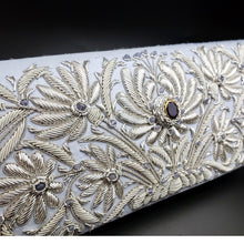 Load image into Gallery viewer, Luxury pale blue silk wedding clutch hand embroidered with silver flowers and inlaid with amethyst, zardozi work, side view.
