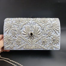 Load image into Gallery viewer, Luxury wedding clutch bag in pale blue silk embroidered with silver all over floral pattern and embellished with central facet cut amethyst gemstone and aqua chalcedony gemstones, bridal purse, mother of the bride purse, blue and silver zardozi purse.
