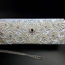 Load image into Gallery viewer, Luxury long slim wedding clutch bag in pale blue silk embroidered with silver all over floral pattern and embellished with central facet cut amethyst gemstone and aqua chalcedony gemstones, bridal purse, mother of the bride purse, blue and silver zardozi purse.
