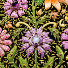 Load image into Gallery viewer, Large trinket box hand embroidered with colorful flowers and inlaid with moonstone and amethyst, close up view.