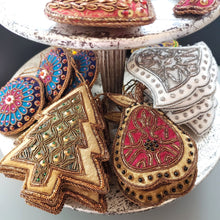 Load image into Gallery viewer, Tray of hand made hand embroidered beaded vintage inspired velvet Christmas tree hanging ornaments.