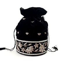 Load image into Gallery viewer, Luxury black velvet bucket bag embroidered with silver colored flowers.
