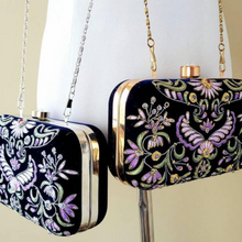 Load image into Gallery viewer, Two formal navy velvet small clutch bags embroidered with silk purple flowers, gold tone or silver tone hardware.