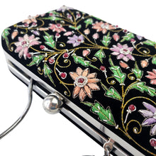 Load image into Gallery viewer, Embroidered black velvet hard case clutch embroidered with multicolor flowers, top view, BoutiqueByMariam.