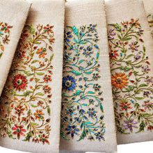 Load image into Gallery viewer, Gold beige slim crossbody bag hand embroidered with colorful flowers and inlaid with gemstones.