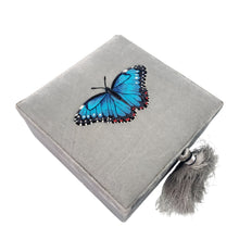 Load image into Gallery viewer, Gray velvet square gift box embroidered with blue morpho butterfly BoutiqueByMariam. 
