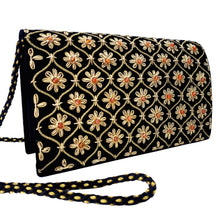 Load image into Gallery viewer, Side view of luxury black velvet evening clutch bag embroidered in a gold diamond trellis pattern with small flowers embellished with genuine carnelian gemstones, wedding clutch, black and gold zardozi purse.