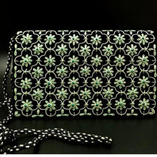 Load image into Gallery viewer, Luxury black velvet evening clutch bag embroidered with silver quatrefoil cloverleaf pattern and green flowers and embellished with genuine malachite gemstones, floral wedding clutch, silver and black and green zardozi purse.