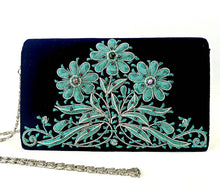 Load image into Gallery viewer, Luxury black velvet evening clutch bag embroidered with three teal blue daisy flowers and embellished with genuine gemstones, floral wedding clutch, black and blue zardozi purse.