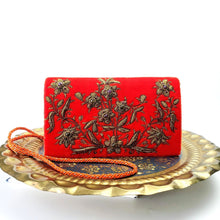 Load image into Gallery viewer, Luxury orange velvet clutch bag embroidered with antique gold flowers and embellished with gemstones zardozi purse. 
