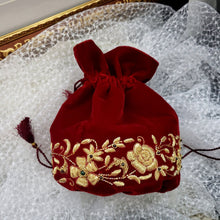 Load image into Gallery viewer, Luxury red velvet embroidered bucket bag with embroidered gold flowers, zardozi potli bag.
