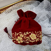 Load image into Gallery viewer, Luxury red velvet embroidered bucket bag with embroidered gold flowers, zardozi potli bag.