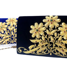 Load image into Gallery viewer, One black velvet purse and one blue velvet purse embroidered with gold zardozi daisy flowers. 
