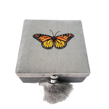 Load image into Gallery viewer, Orange monarch butterfly hand embroidered on gray velvet keepsake box, jewelry storage box.