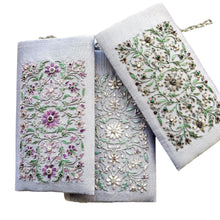 Load image into Gallery viewer, Three gray silk slim crossbody bags embroidered with purple, white or gray flowers. 
