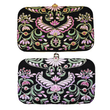 Load image into Gallery viewer, Two black velvet embroidered minaudiere, top one pink flowers with gold outline, bottom one lavender flowers with silver lining BoutiqueByMariam.