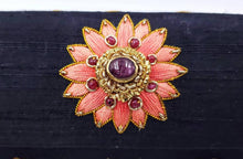 Load image into Gallery viewer, Embroidered peach silk medallion with rubies, close up view.