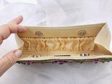 Load image into Gallery viewer, Gold silk clutch embroidered with pink flowers and embellished with emeralds, zardozi handbag, interior view.