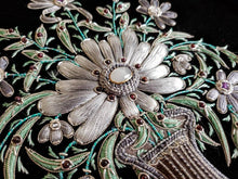 Load image into Gallery viewer, Embroidered floral wall art, gray silk flowers in tall vase embroidered on black velvet, zardozi wall art, close up view.