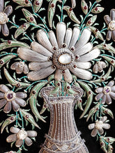 Load image into Gallery viewer, Embroidered floral wall art, gray silk flowers in tall vase embroidered on black velvet, zardozi wall art, close up view.