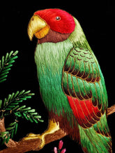 Load image into Gallery viewer, Embroidered green parrot tapestry, green silk parrot embroidered on black velvet, zardozi art, close up. 

