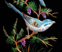 Load image into Gallery viewer, Embroidered bird tapestry of two blue birds embroidered in silk on black velvet with ornate border, zardozi art, close up view.