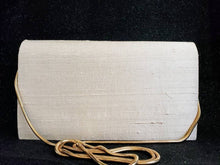 Load image into Gallery viewer, Dupioni silk ivory clutch bag with gold tone chain, rear view. 
