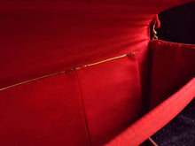 Load image into Gallery viewer, Orange velvet clutch bag embroidered with metallic copper flowers and embellished with star rubes, zardozi evening bag, gold tone strap, interior view.