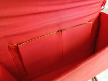 Load image into Gallery viewer, Red satin interior zardozi clutch bag with two slip pockets lined in gold color.