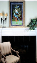 Load image into Gallery viewer, Embroidered birds wall art, three blue birds in a tree embroidered in silk on black velvet with ornate border, framed, zardozi art, hanging over fireplace.