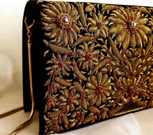 Load image into Gallery viewer, Luxury black velvet zardozi clutch bag with copper metallic thread embroidery and star ruby, goldtone shoulder strap, side view