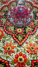 Load image into Gallery viewer, Large hand embroidered red floral silk tapestry wall hanging with star rubies, zardozi jewel carpet wall art, framed, close up view of central medallion.
