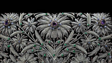 Load image into Gallery viewer, Luxury hand embroidered black velvet evening bag clutch in floral pattern with amethyst gemstones, close up view.