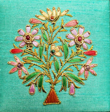 Load image into Gallery viewer, Square teal silk gift box jewelry box embroidered with multicolor flowers, zardozi box, close up view.
