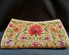 Load image into Gallery viewer, Peach silk clutch bag with multicolored silk flowers and central red lotus flower embellished with star rubies, zardozi purse

