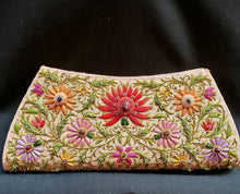 Load image into Gallery viewer, Peach silk clutch bag with multicolored silk flowers and central red lotus flower embellished with star rubies, zardozi purse
